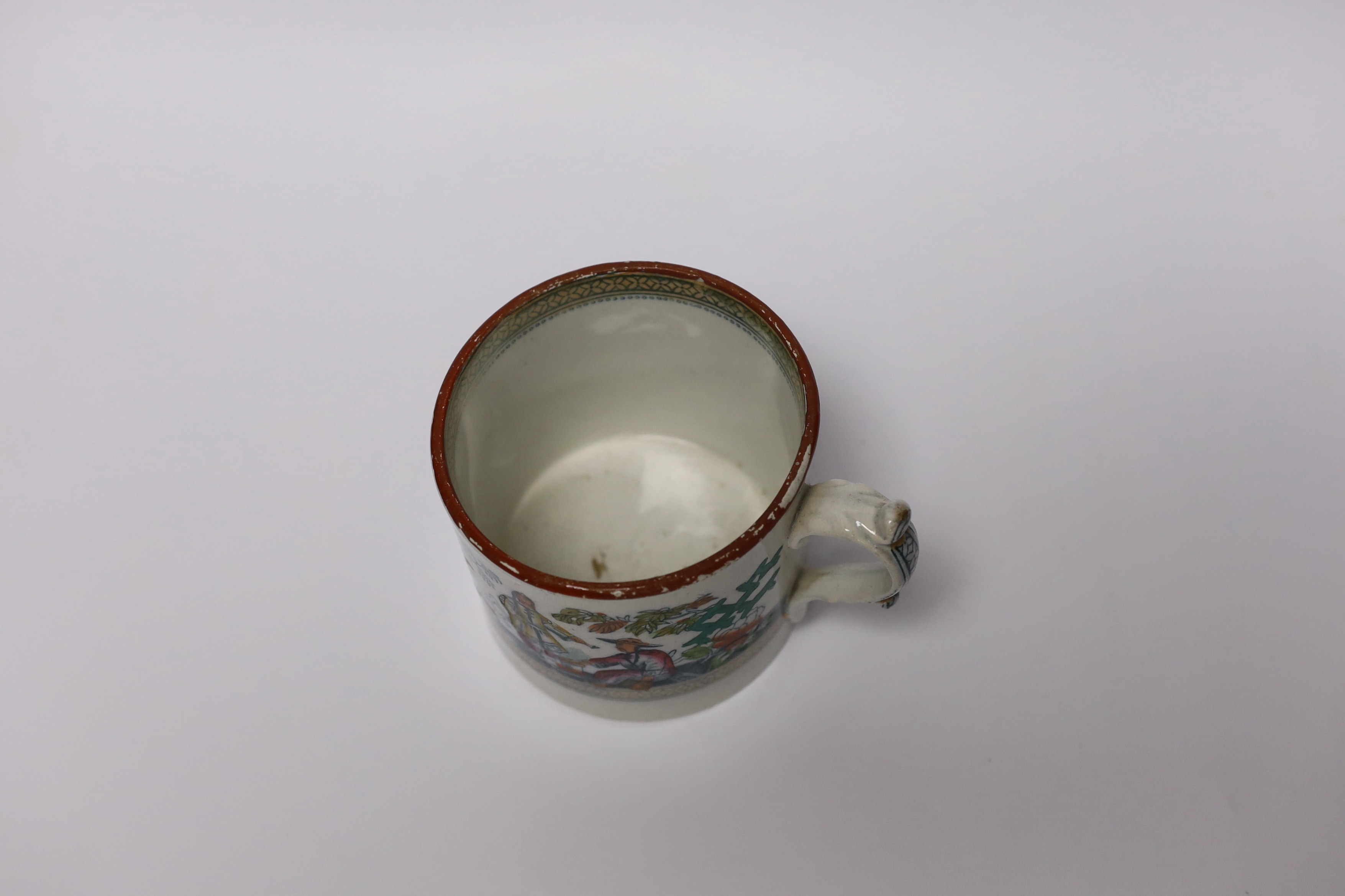 An early 19th century Staffordshire pearlware cylindrical large tankard decorated with Chinese figures and motifs (E and H), 10cm